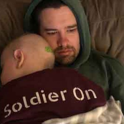 Archer while undergoing chemotherapy in 2019, with his dad. Image: Claire Bermingham.